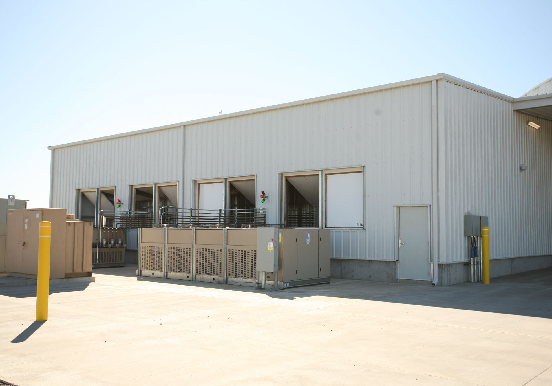 Industrial warehouse exterior with loading docks